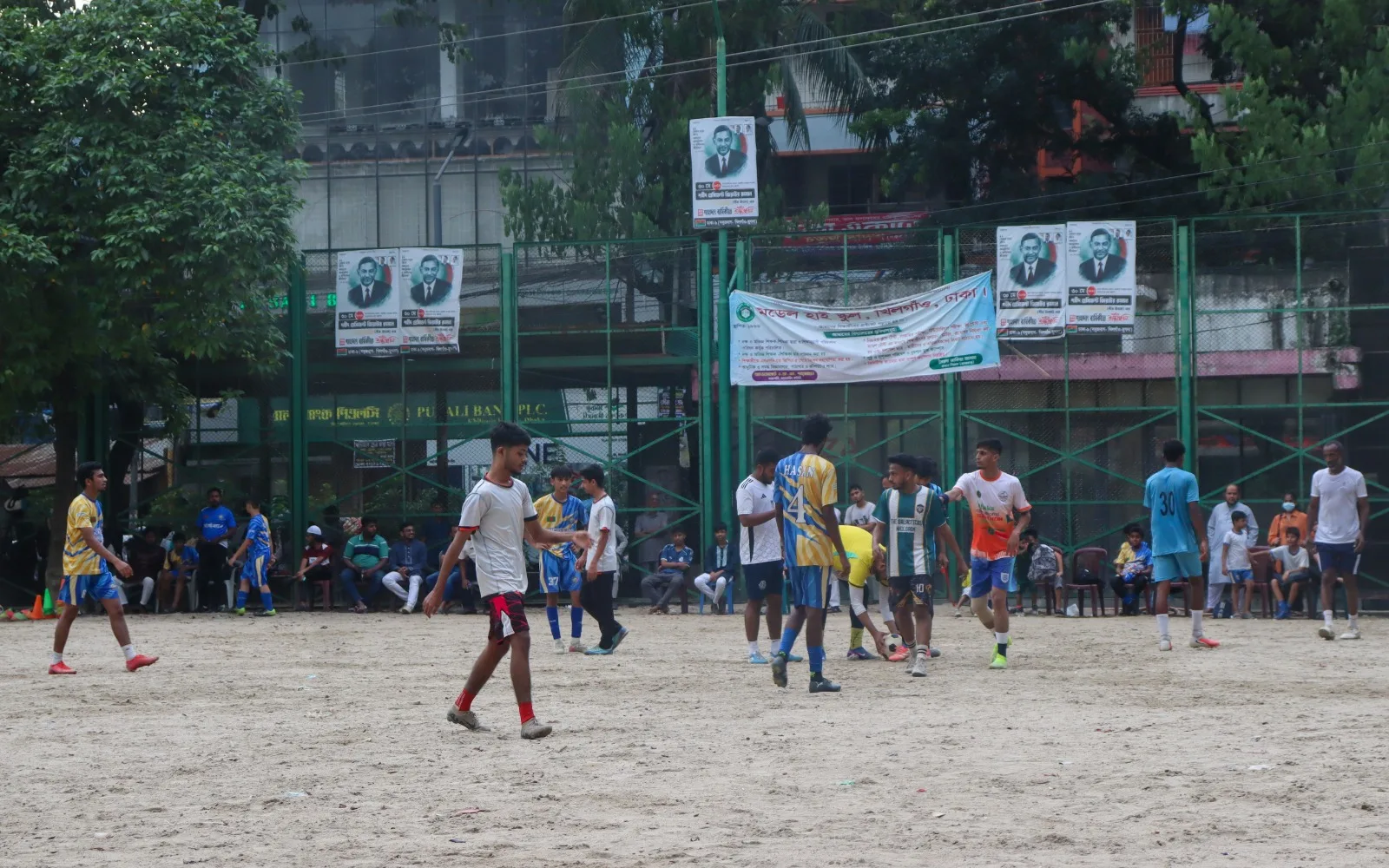 An open field lies dominated by boys at play. Wasiul Bahar/Nutshell Today