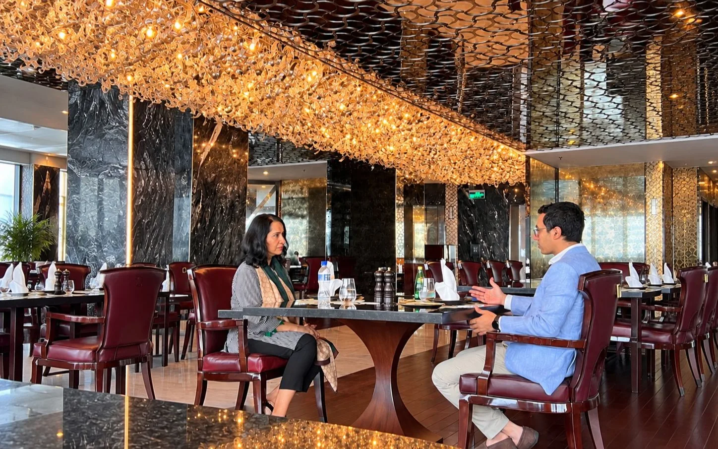 Sear Restaurant provides a luxurious backdrop for the conversation