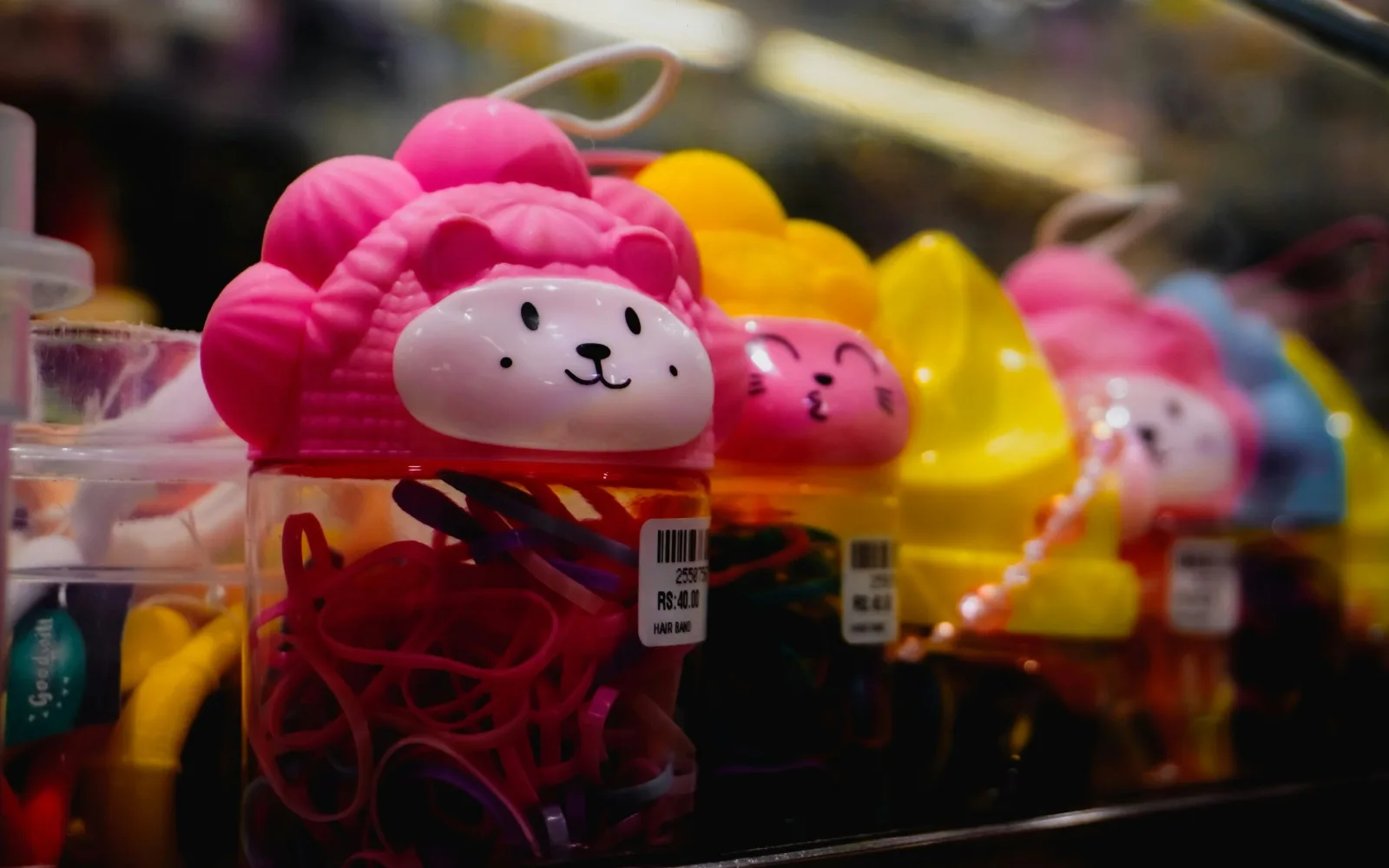 The writer recalls buying colourful accessories simply because they were appealing.