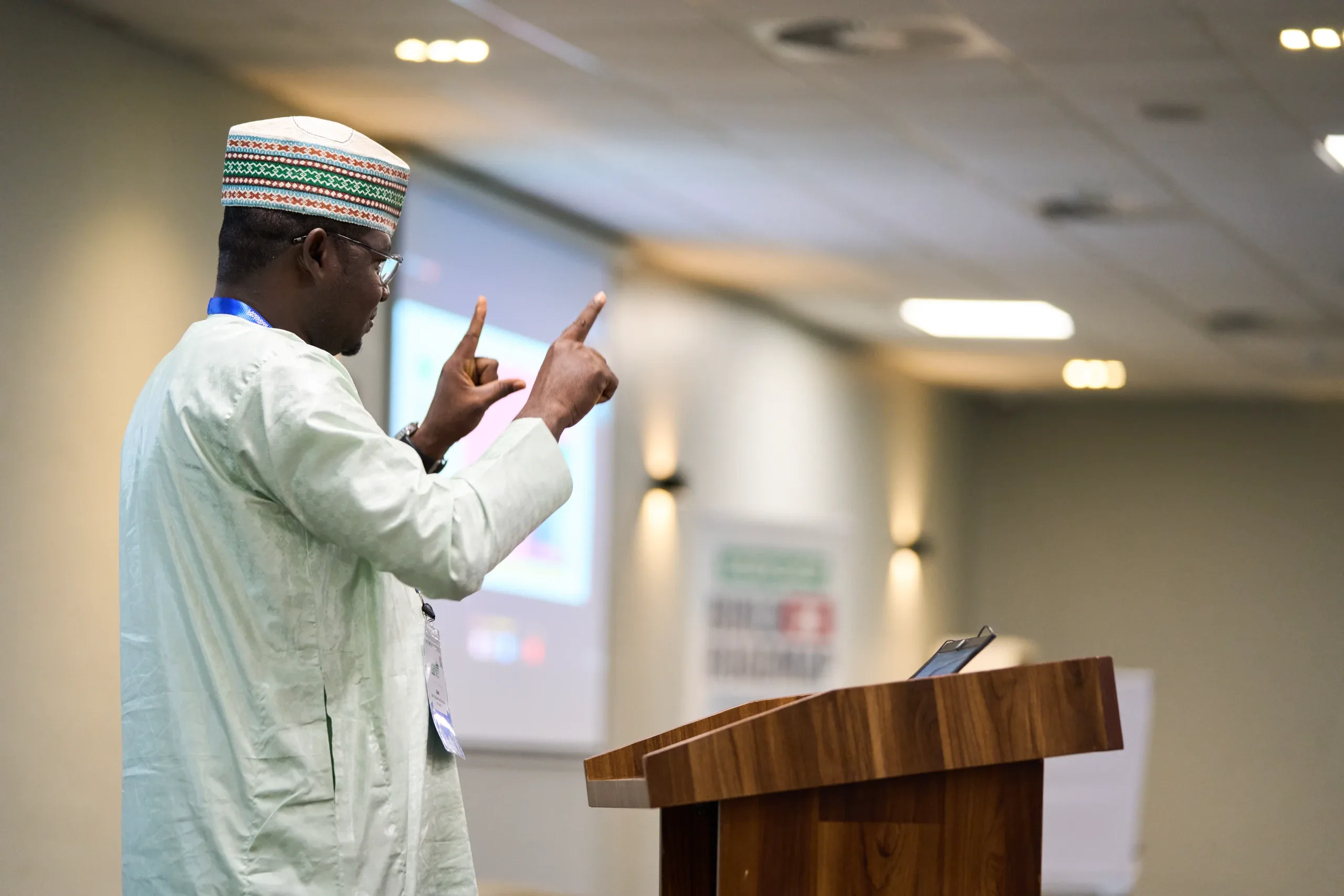 Sani presenting a speech on his project to preserve Hausa Sign Language